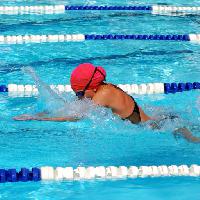 Pixwords Bilden med simma, simmare, rött, huvud, kvinna, sport, vatten Jdgrant